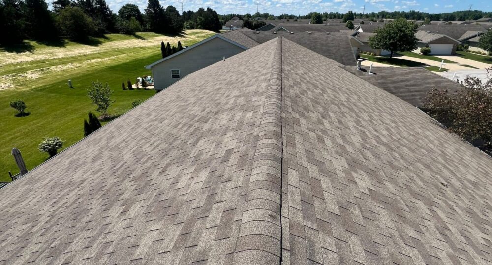 Roof replacement in Michigan City Indiana featuring new asphalt shingles installed by Weldon Roofing & Construction